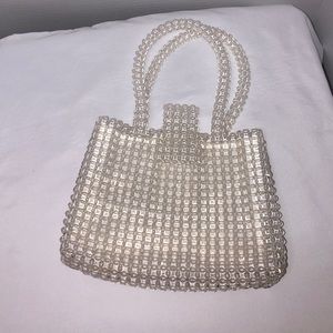 Small clear beaded purse with silk inside